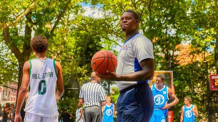 Smush Parker refereeing in a park